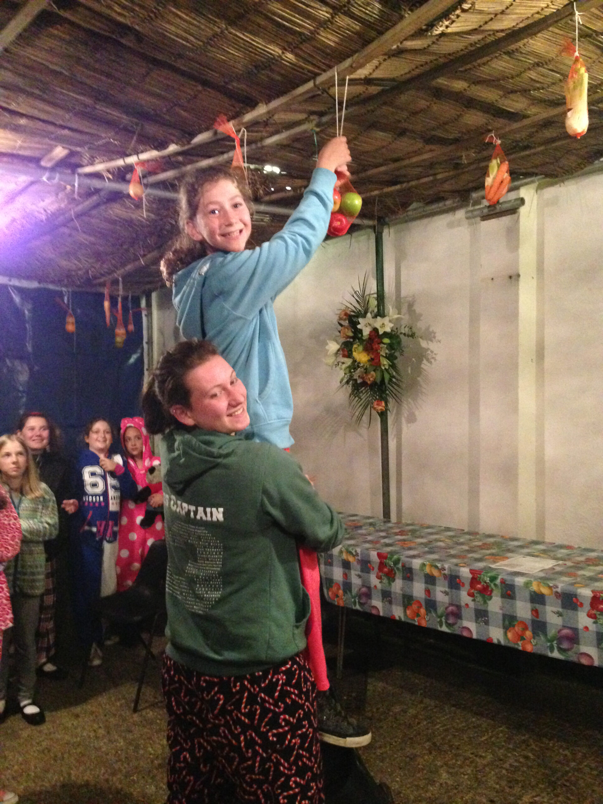 Guides Help to Decorate the Succah