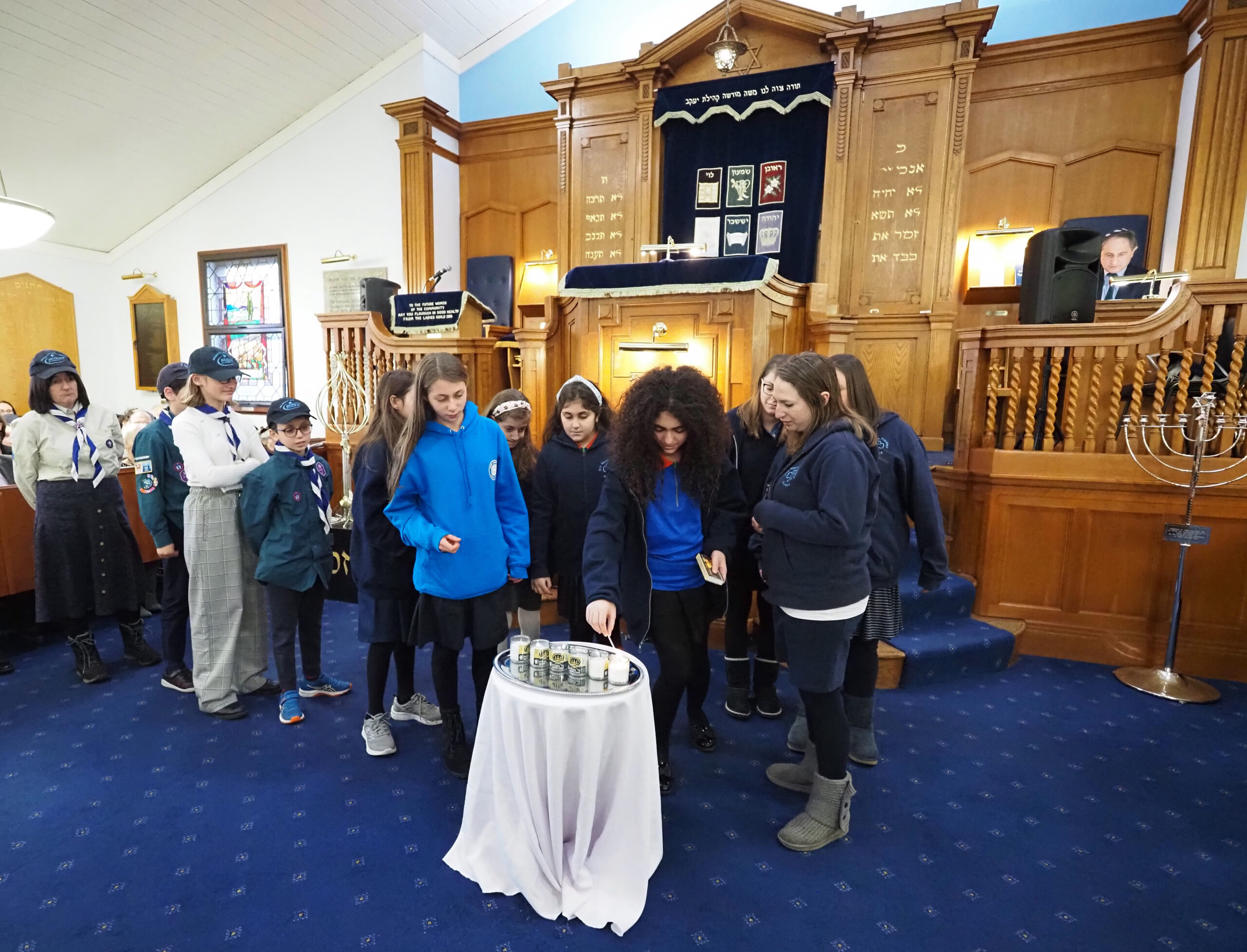 Lighting of the 6 Memorial Candles by 5th North Finchley Guides and 20th North Finchley Scouts