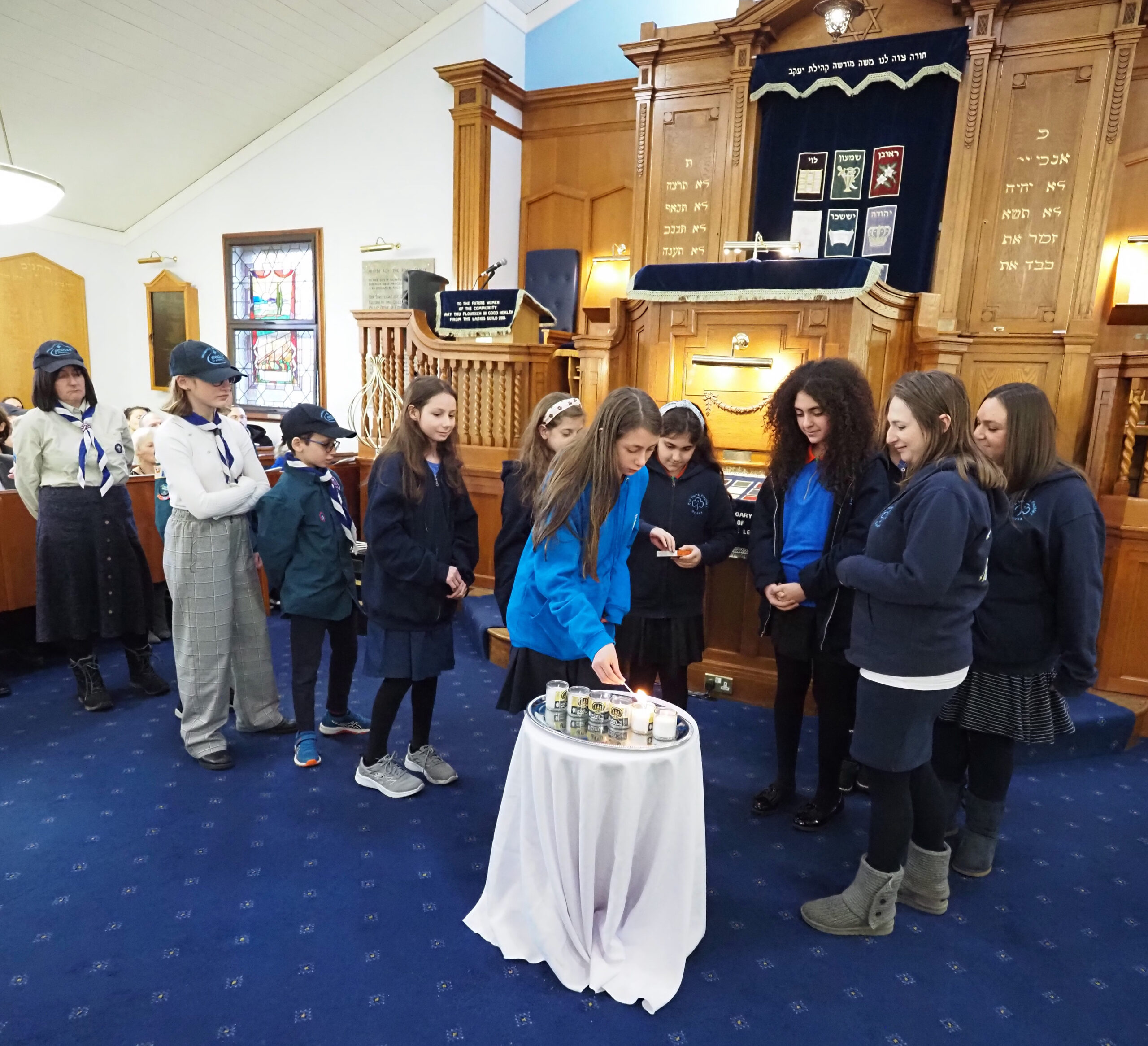 Lighting of the 6 Memorial Candles by 5th North Finchley Guides and 20th North Finchley Scouts