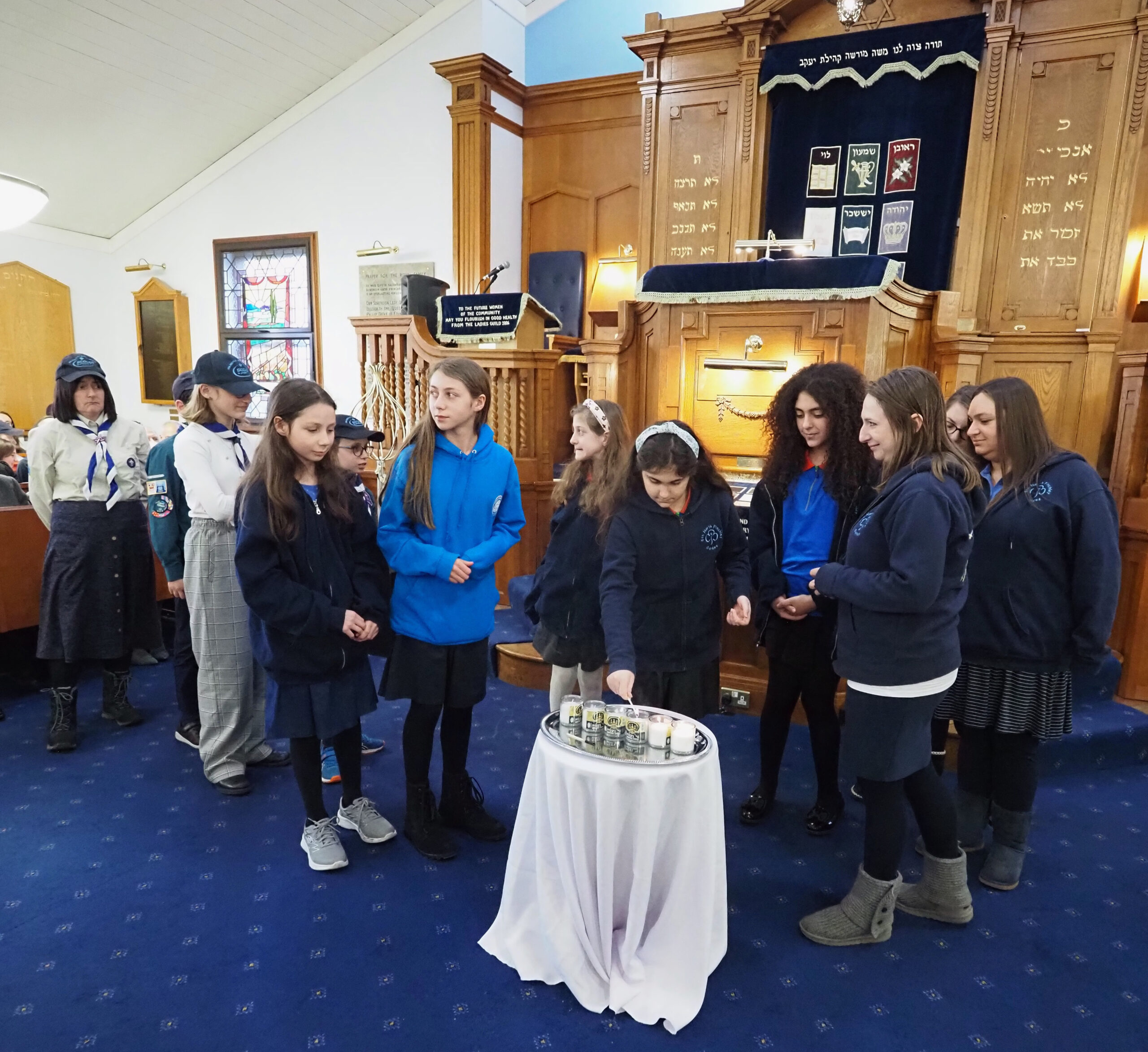 Lighting of the 6 Memorial Candles by 5th North Finchley Guides and 20th North Finchley Scouts