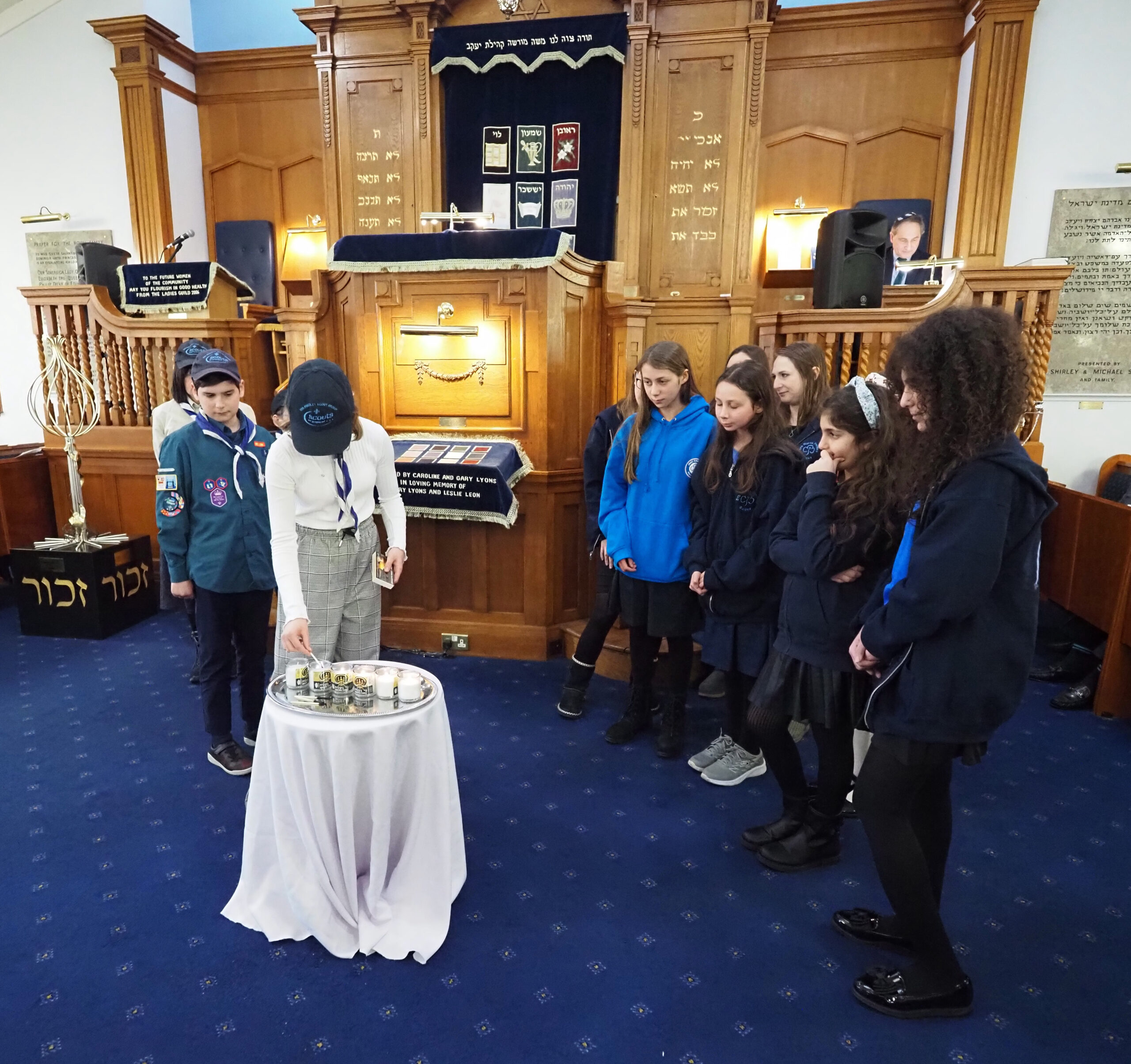 Lighting of the 6 Memorial Candles by 5th North Finchley Guides and 20th North Finchley Scouts