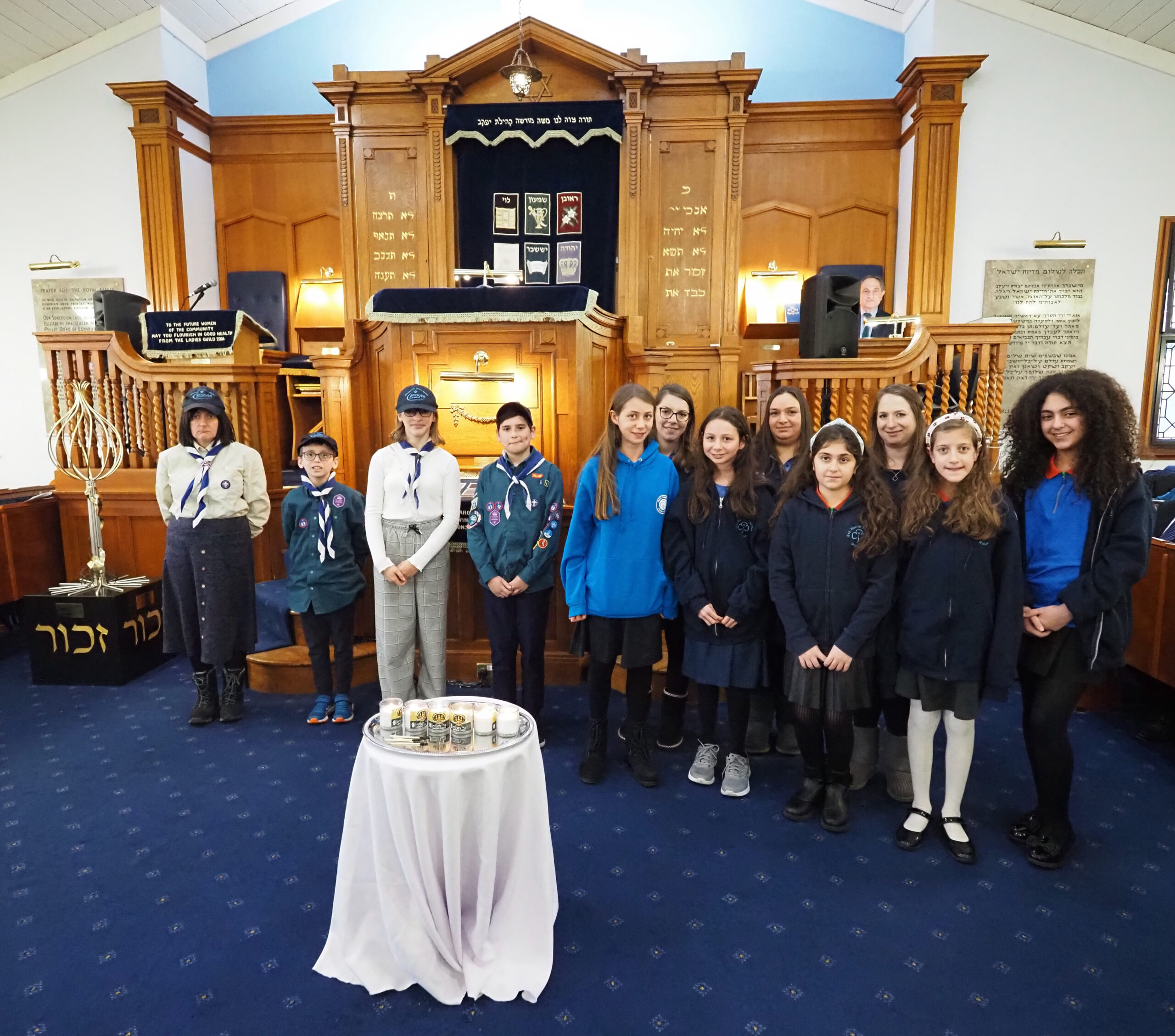 Lighting of the 6 Memorial Candles by 5th North Finchley Guides and 20th North Finchley Scouts